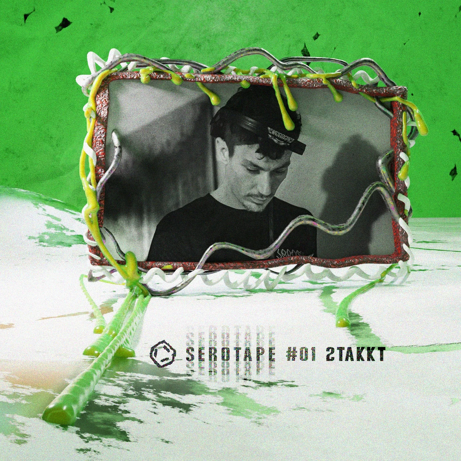Experimental green cover artwork with a framed monochrome portrait and organic cable forms
